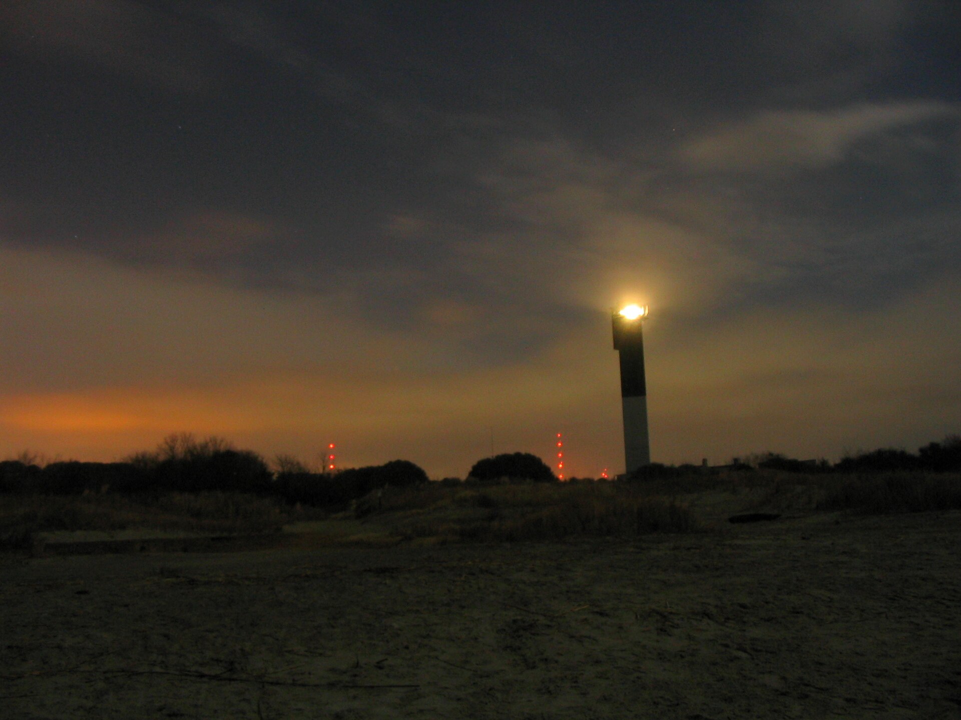 Sullivan's Island Lighthouse viewed from the beach at dusk