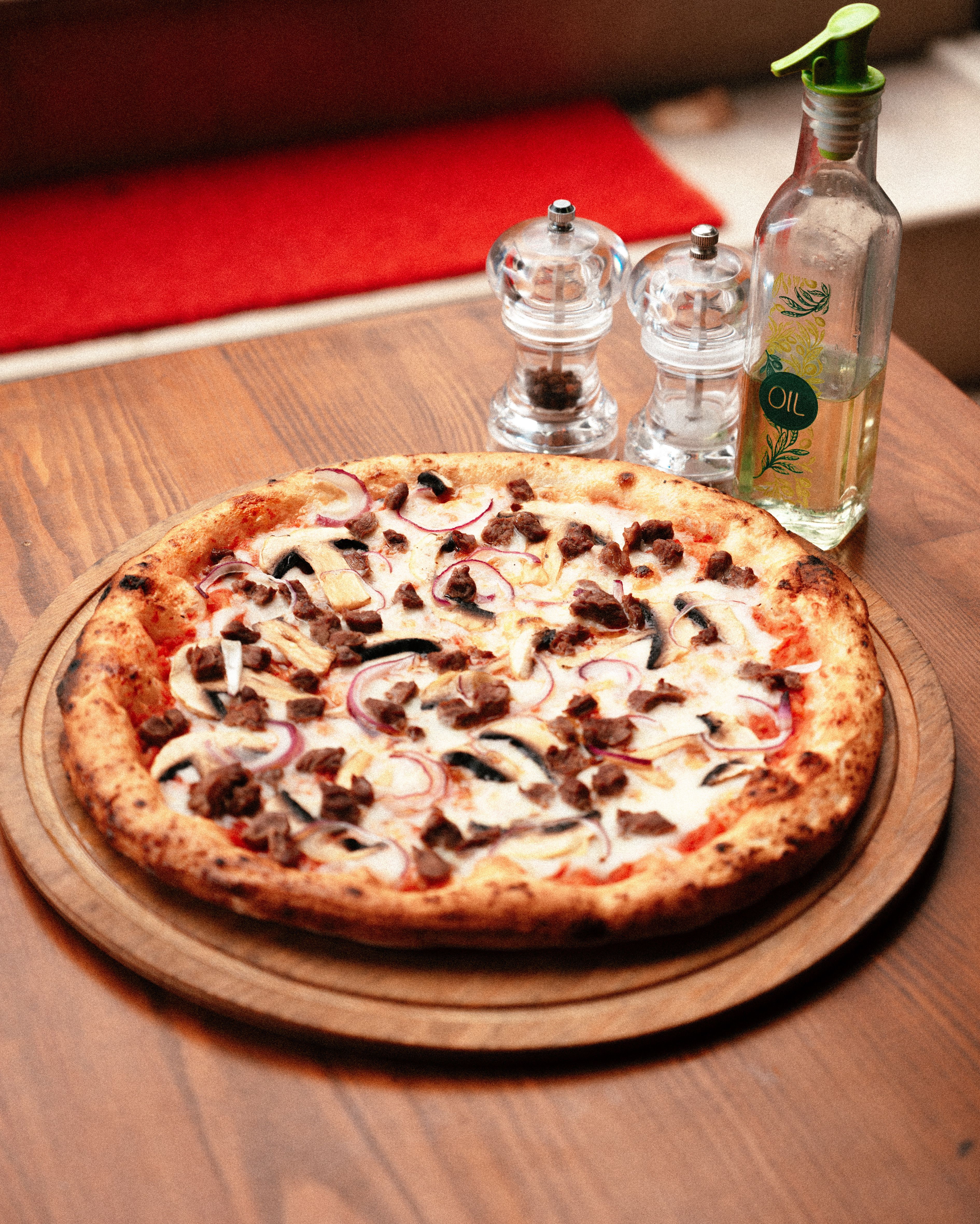 Generic wood-fired pizza served in a restaurant